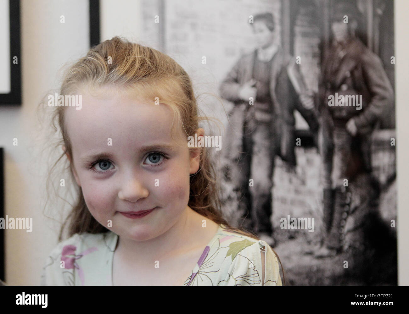 Five year old Grainne Monahan gets a sneak preview of the new major photographic exhibition entitled 'Power and Privilege' giving rare insights into how the other half lived in Big Houses in Ireland during the mid-1800s and early 1900s at the National Photographic Archive in Temple Bar. Stock Photo