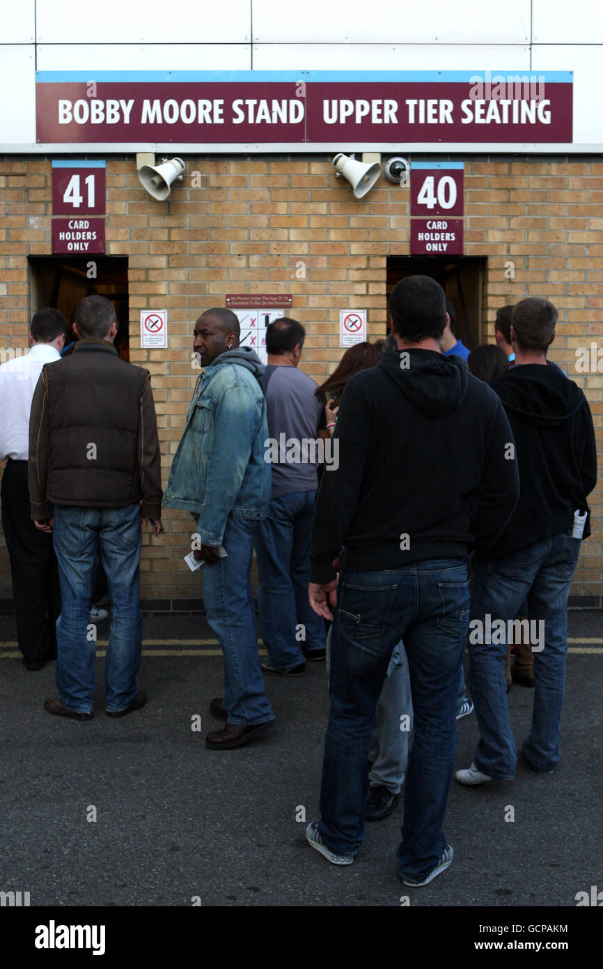 Fans queue up outside the Bobby Morre stand as the wait to enter the ...