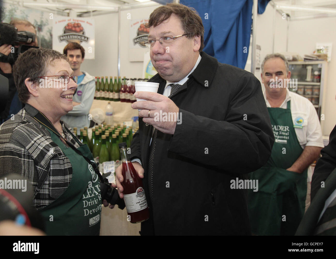 Taoiseach Brian Cowen drinks some mulled apple juice as he pays a visit to the National Ploughing Championships in in Athy Co Kildare. Stock Photo