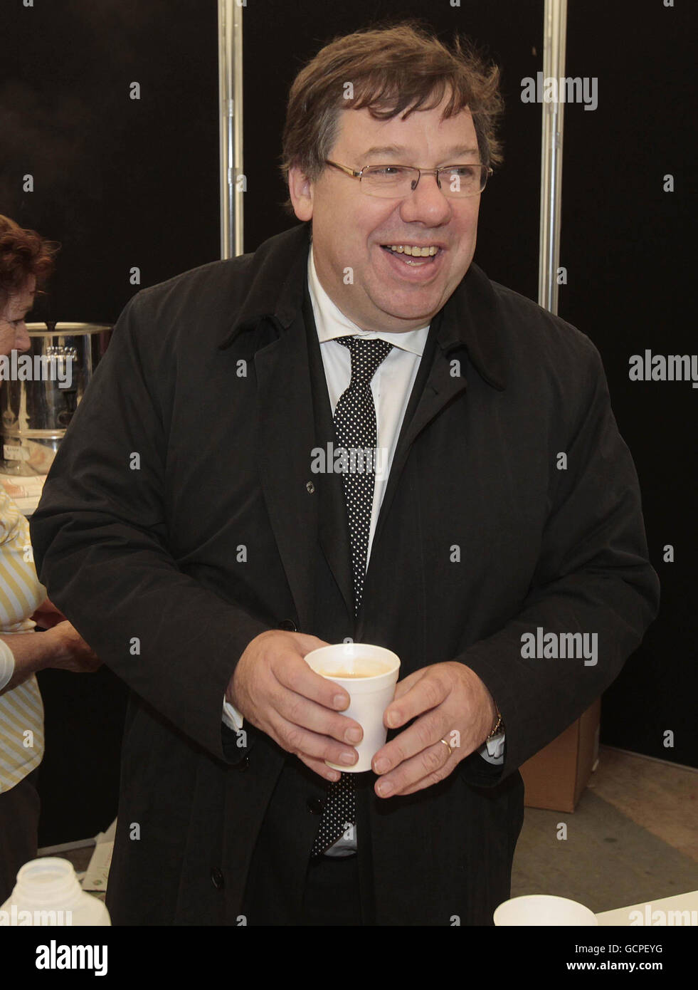 Taoiseach Brian Cowen drinks a cup tea as he pays a visit to the National Ploughing Championships in in Athy Co Kildare. Stock Photo