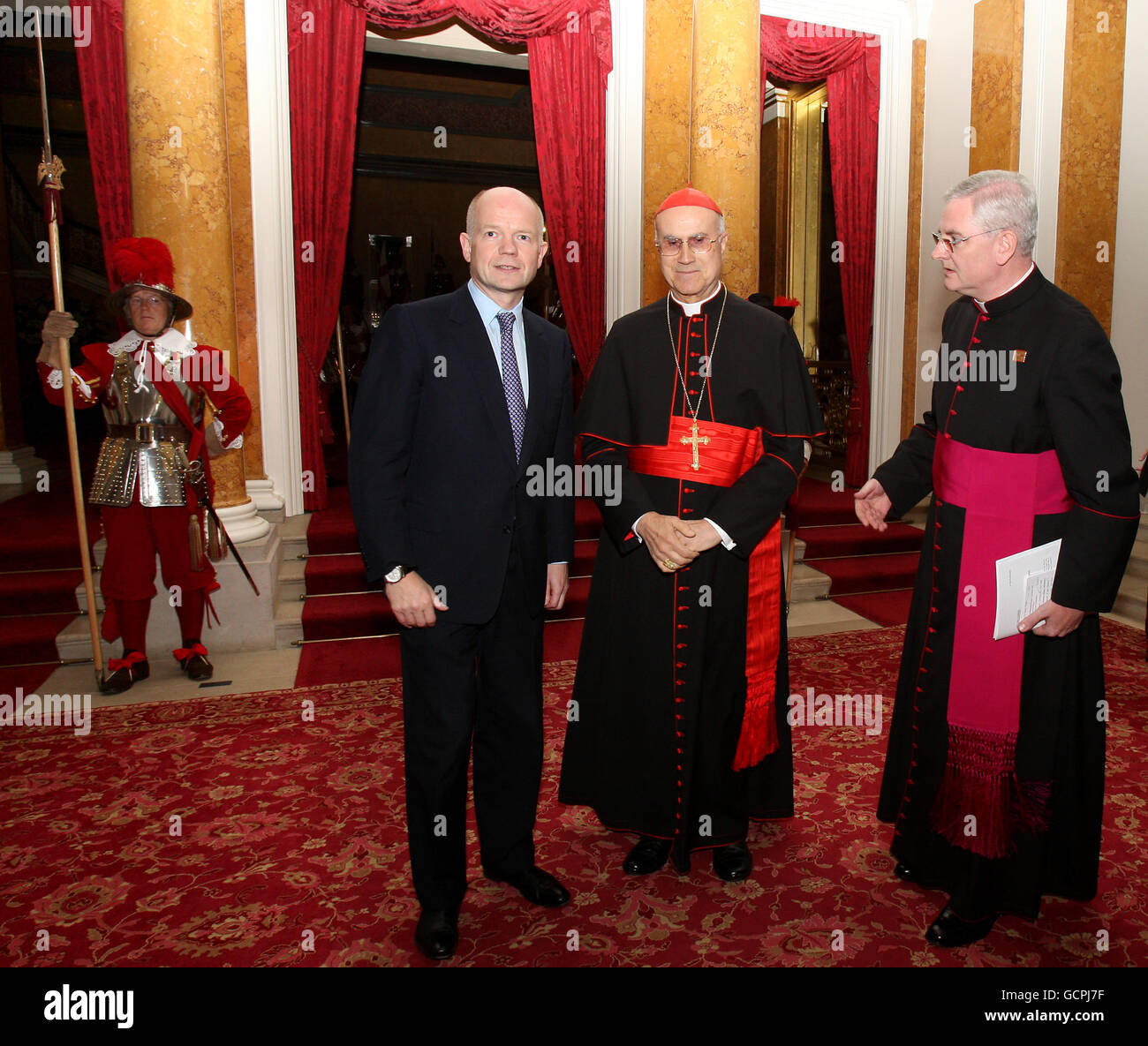 Foreign Secretary William Hague receives Cardinal Tarcisio Bertone, S.D.B., Secretary of State, Camerlengo of the Holy Roman Church, Archbishop emeritus of Genoa at a State Banquet in honour of Pope Benedict XV1 at Lancaster House in central London on the second day of his State Visit. Stock Photo