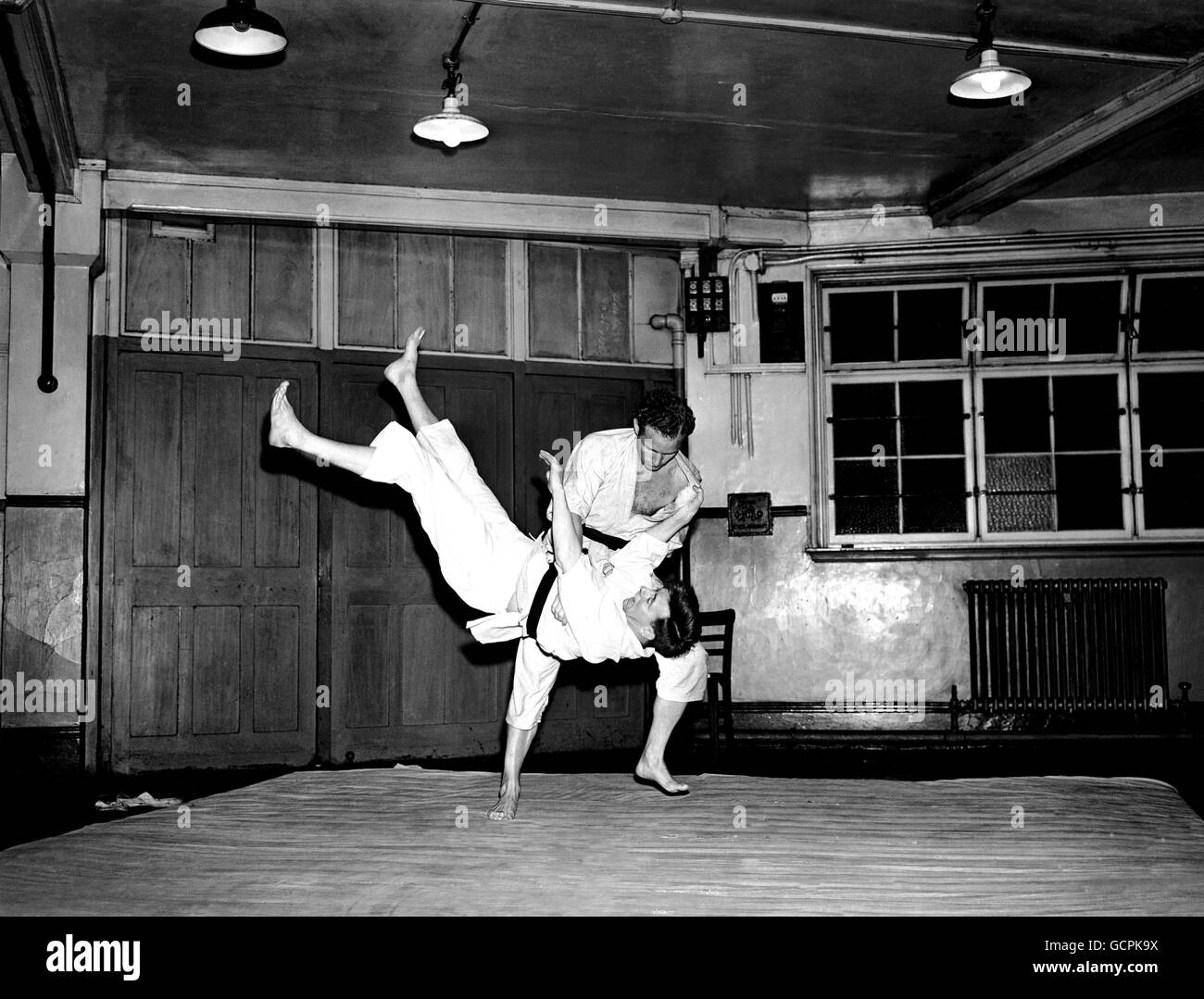 Judo - L.T.E. London Transport Judo - Camden Institute. Black belts (first Dan) John Orr and Harry Hutchings give a demonstration. Stock Photo