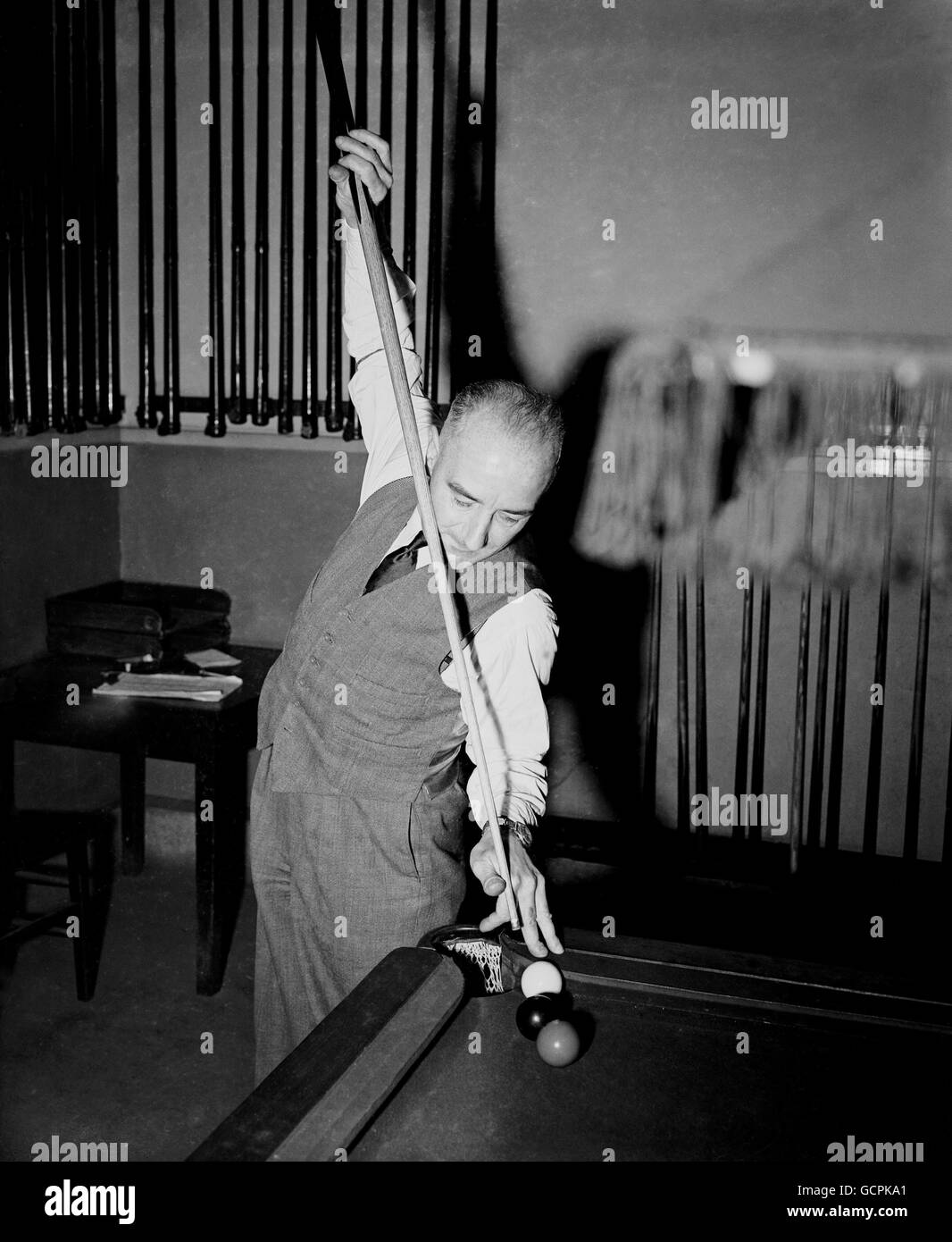 Mr. J.S. Stafford playing snooker, at the general section Sports and Athletics club. Stock Photo