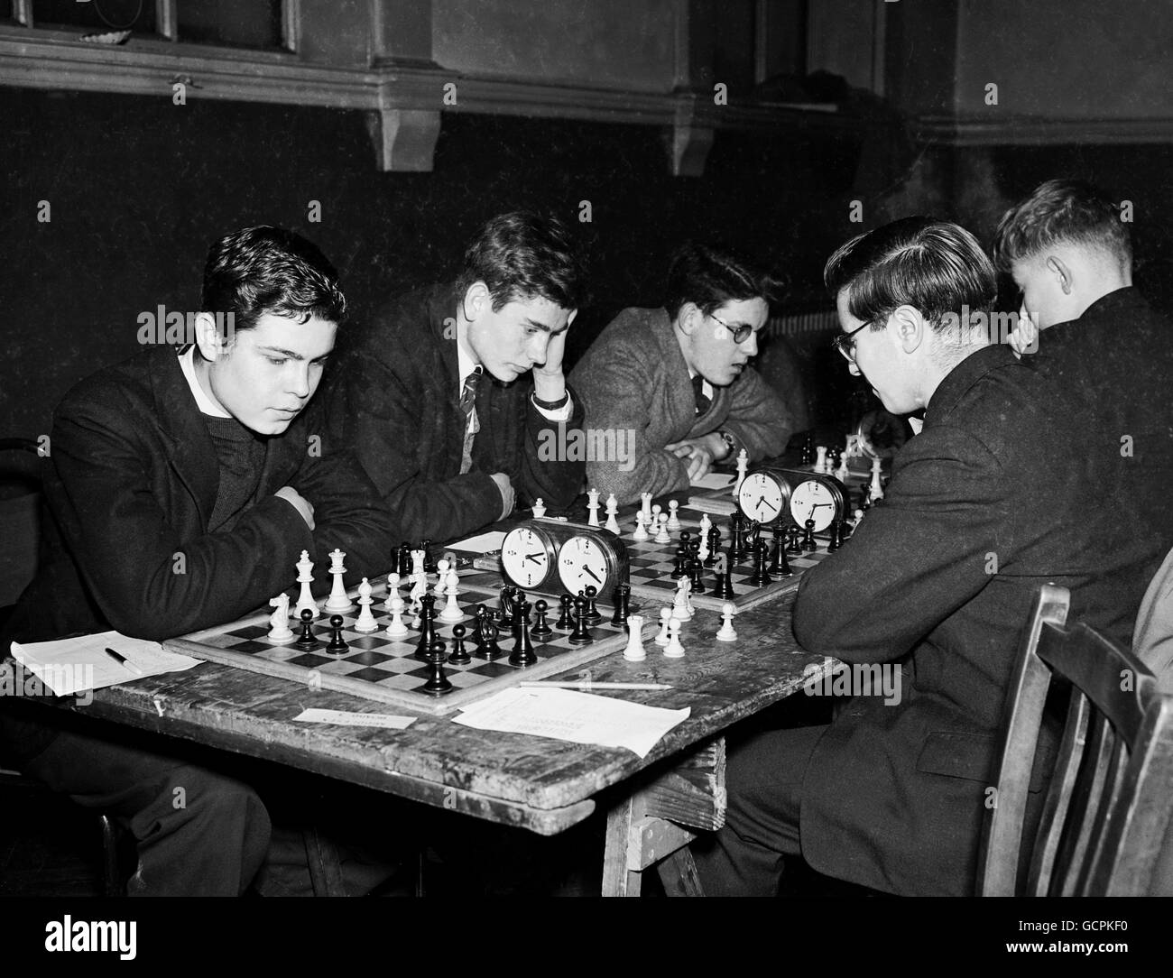 (L-R) P.A. Hampson of Kent, G.C. Warner of Sussex, A.Baker of Oxfordshire and S Golding of Essex during the Junior Chess Championships held at the church institute, Romford Road, Stratford, London. Stock Photo