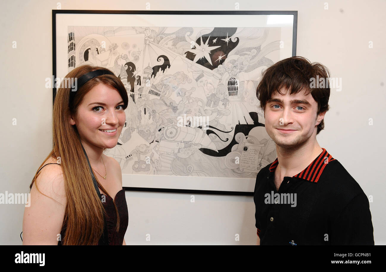Daniel Radcliffe and Lizzie Mary Cullen are seen with her painting ...