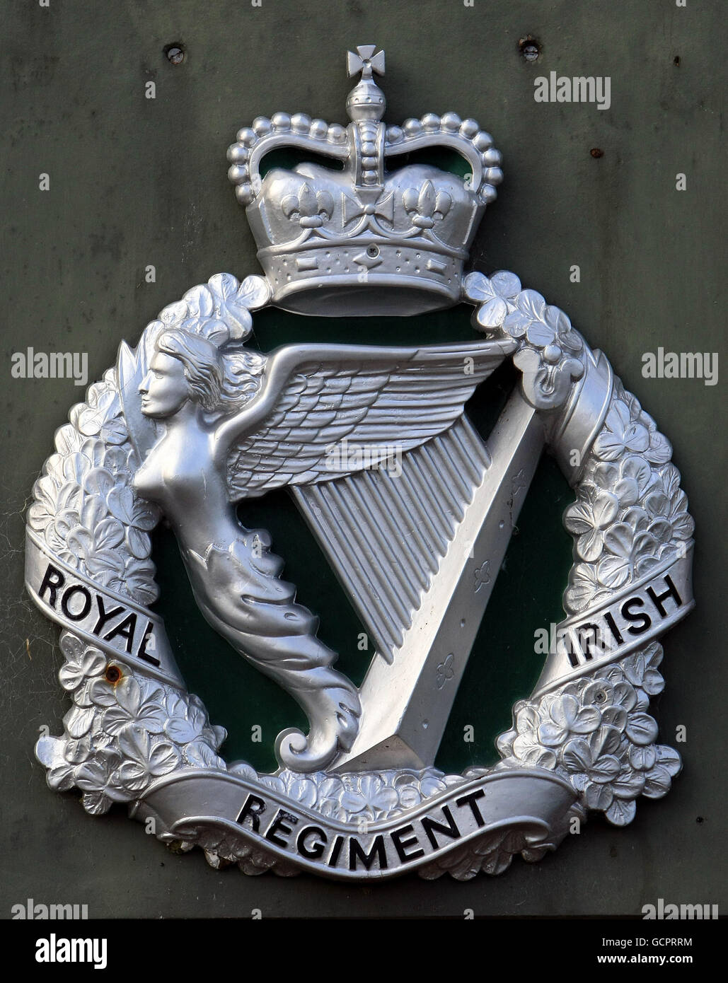 The crest of the Royal Irish Regiment as the 1st Battalion, Royal Irish Regiment prepare to leave for Afghanistan. PRESS ASSOCIATION Photo. Picture date: Wednesday September 15, 2010. The Royal Irish Regiment can trace its history back to 1689, through conflicts including the Napoleonic Wars, the Boer War, World War I and World War II. In 1992 the Royal Irish Rangers merged with the Ulster Defence Regiment to form the Royal Irish Regiment. In memory of its predecessor, the lowest rank soldiers bear the title of Rangers, rather than Private. The battalion forms part of 16 Air Assault Brigade, Stock Photo