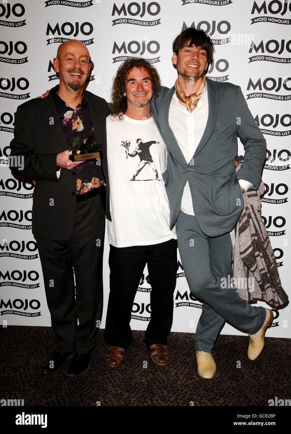 MOJO Honours List 2010 - London. Teardrop Explodes with award and Alex James (R) at the MOJO Honours List 2010 at the Brewery in London. Stock Photo