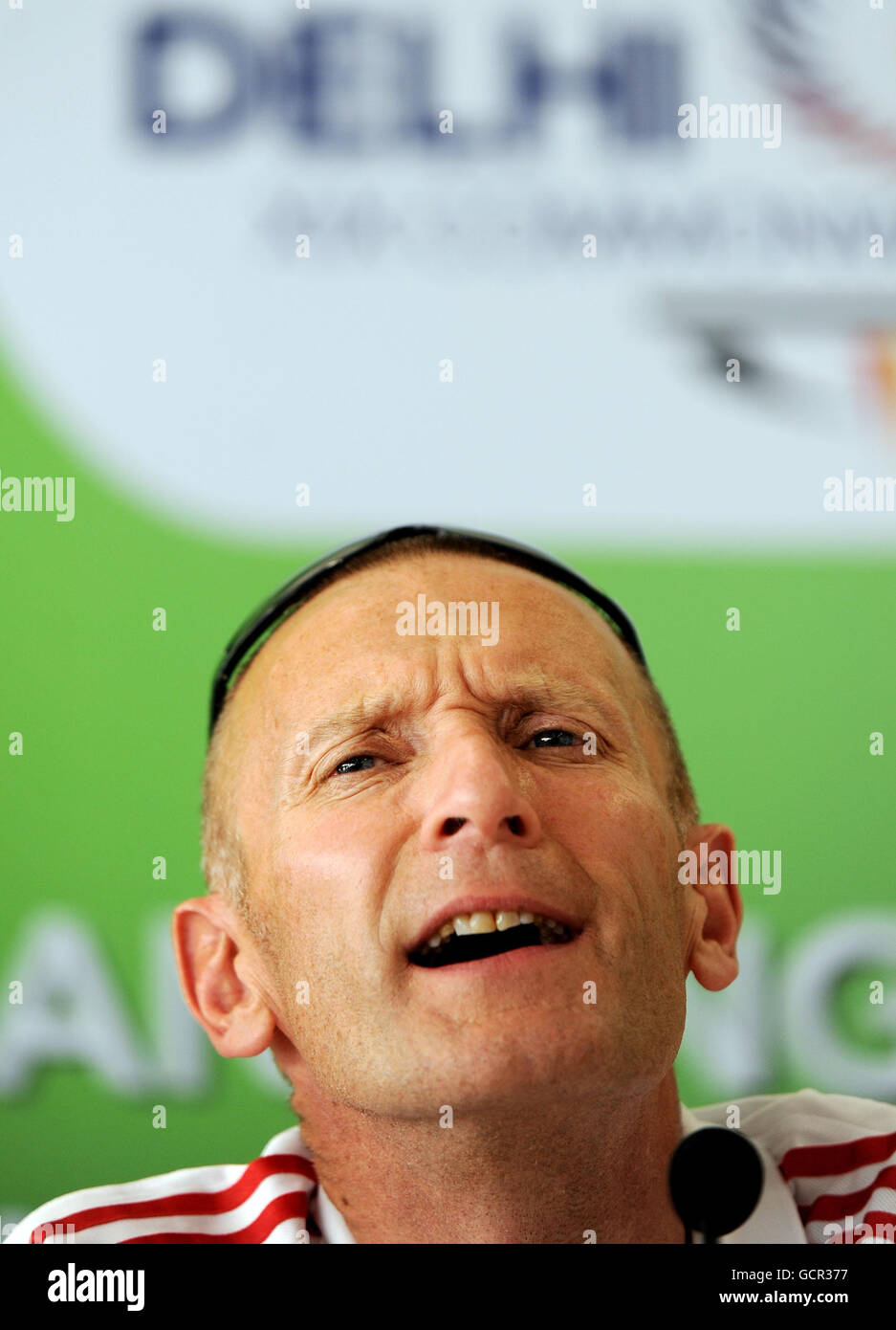 England's Chef De Mission speaks during a press conference at the Athletes Village in Delhi, India. Stock Photo