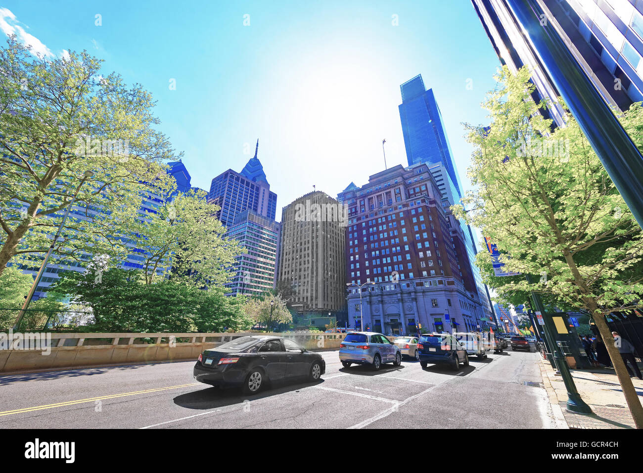 Traffic on JFK boulevard and Penn Center with skyline of skyscrapers in Philadelphia