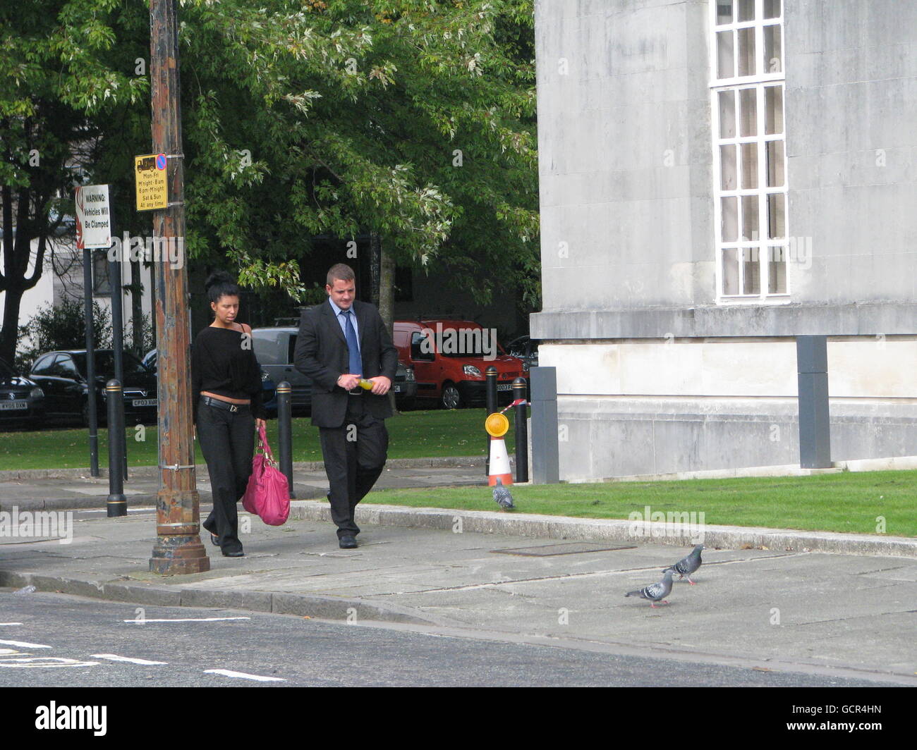 Security guard Sam Bawden leaves Swansea Crown Court with an Security guard Sam Bawden leaves Swansea Crown Court with an