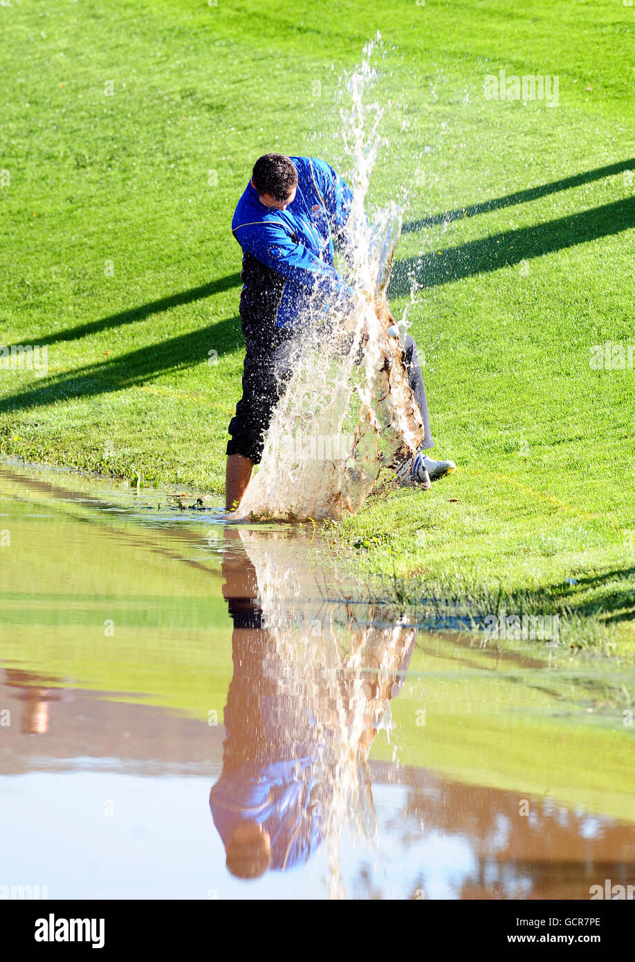Golf - 38th Ryder Cup - Europe v USA - Day Four - Celtic Manor Resort. Europe's Martin kaymer plays a shot from the water during the Ryder Cup at Celtic Manor, Newport. Stock Photo