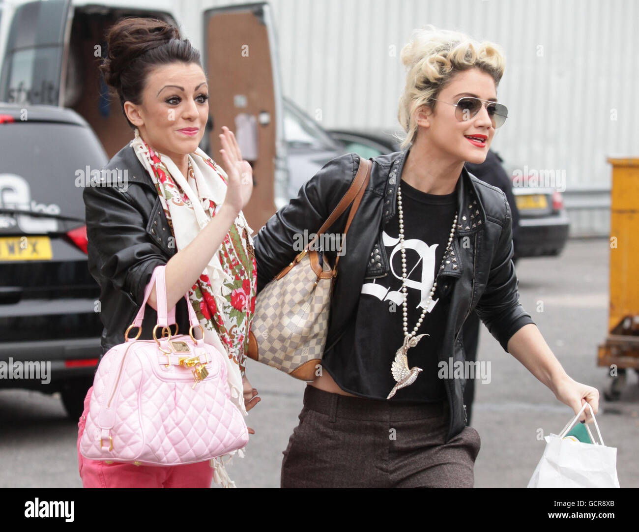 Alternate crop. Cher Lloyd (left) and Katie Waissel arriving for X Factor rehearsals at Fountain Studios in Wembley, north London. Stock Photo