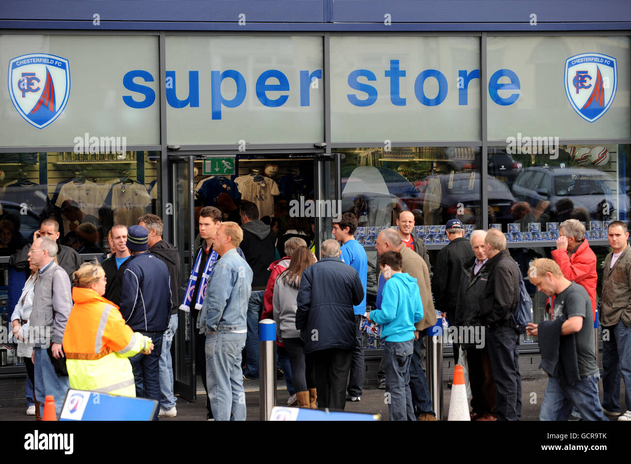 Fans gather outside of the B2net stadium superstore prior to kick off Stock Photo