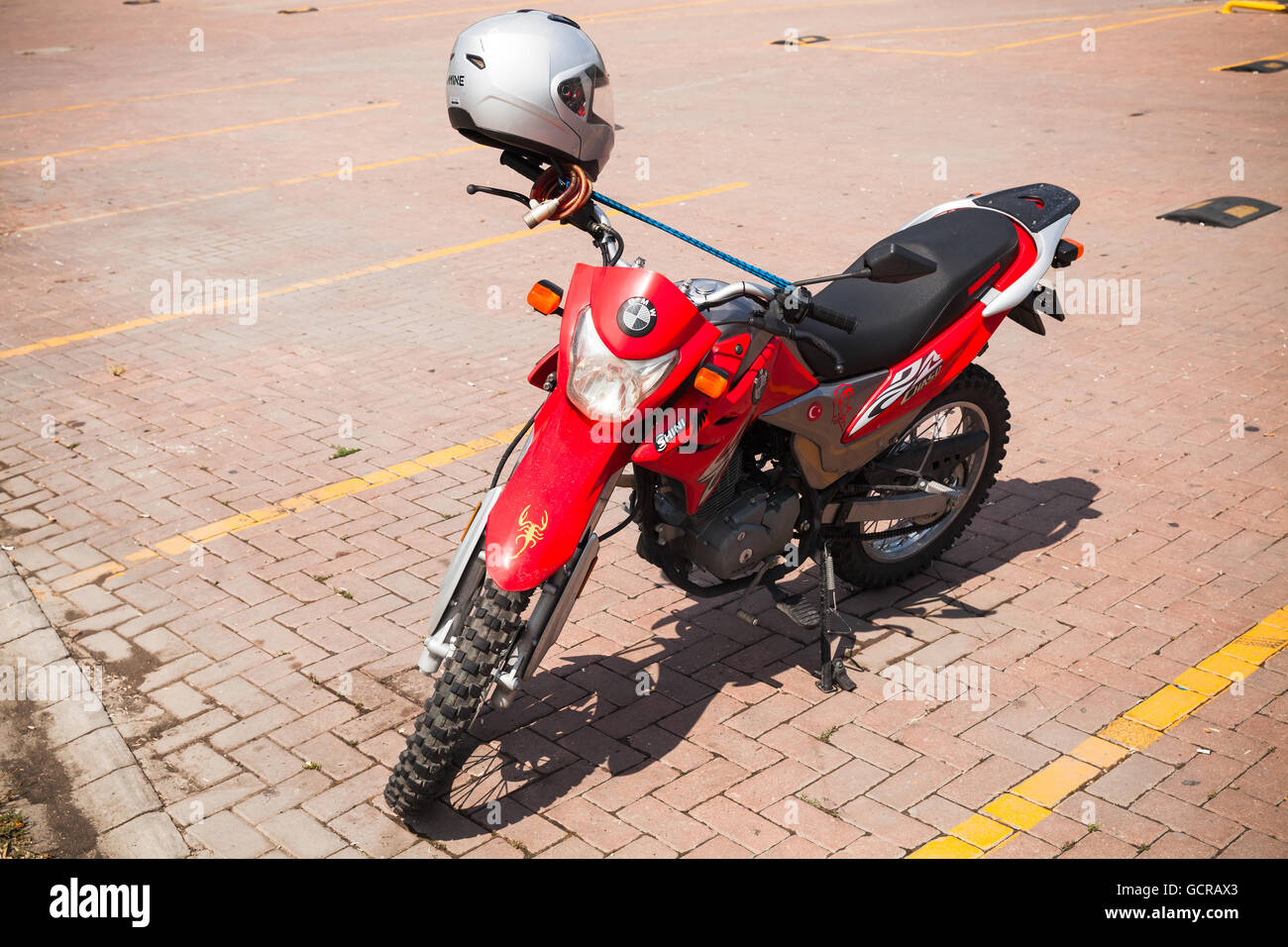 Istanbul, Turkey - June 30, 2016: Red SY150GY 150cc sport motorcycle stands on a parking lot Stock Photo