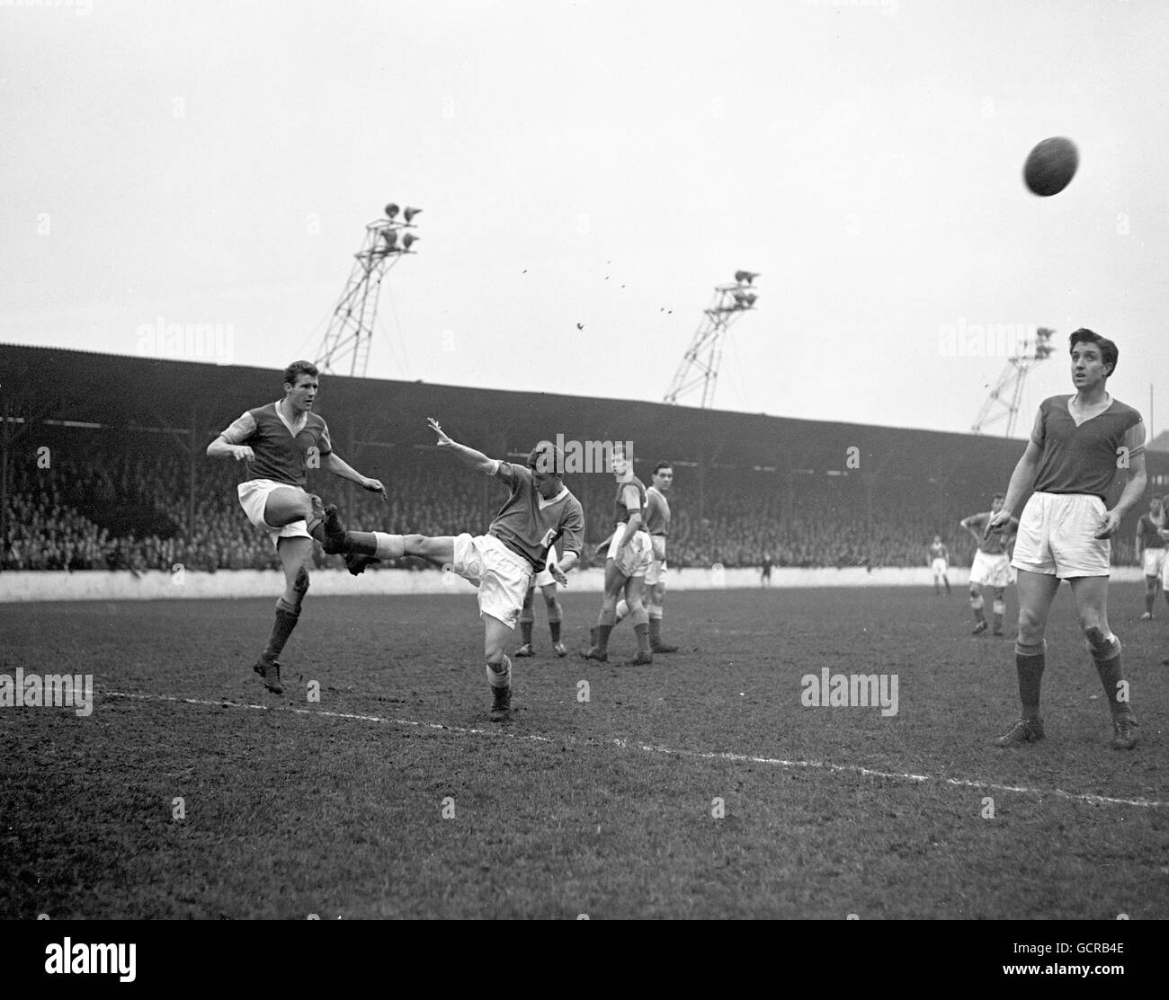 West Ham's Malcolm Allison, left, and Thomas McDonald, the Leicester outside right, in a tussle for the ball. Stock Photo