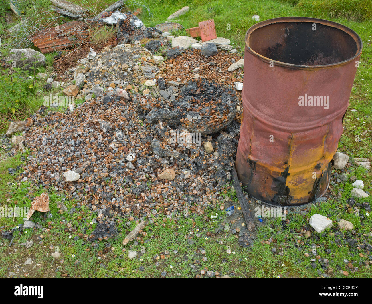 Dustbin used as incinerator Stock Photo Alamy