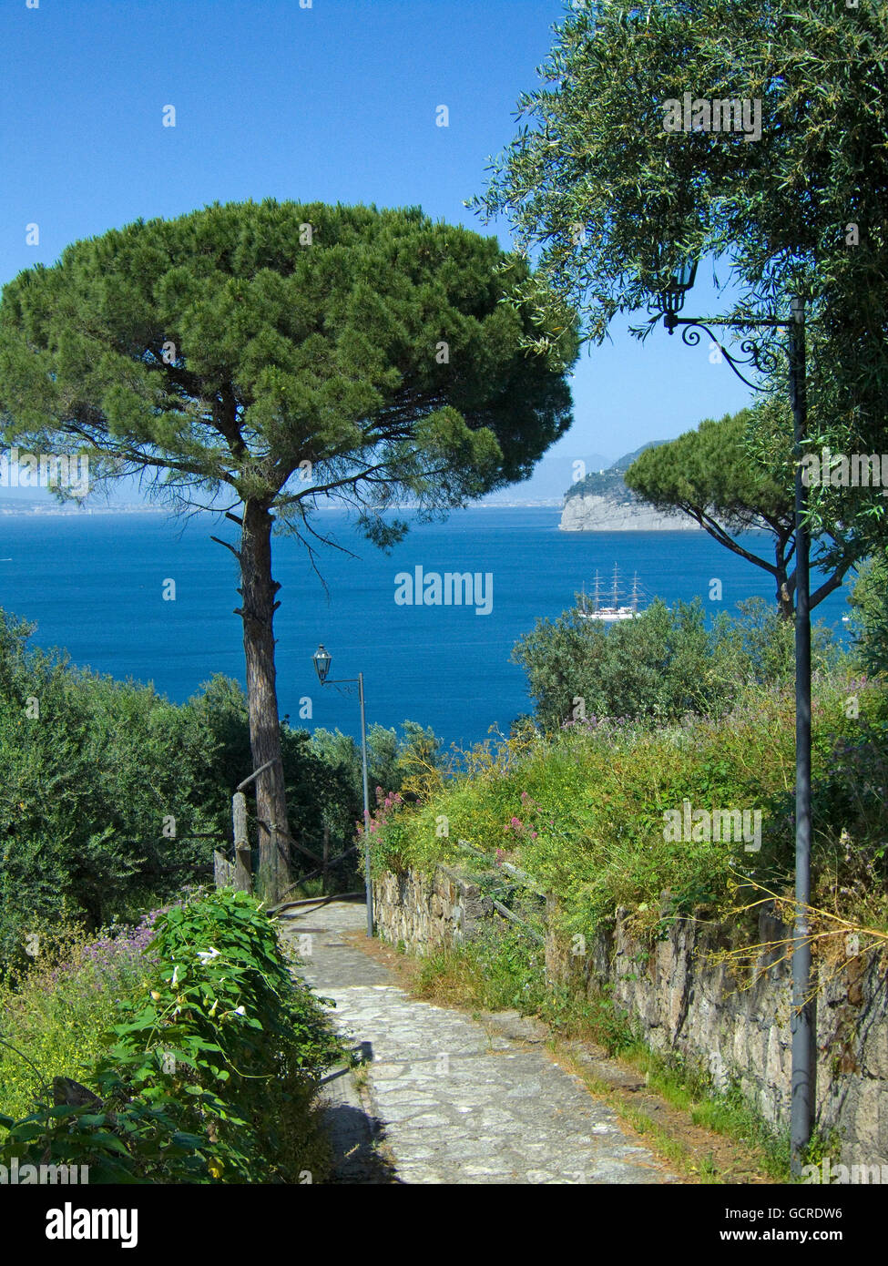 A view down a country lane to the Bay of Naples at Sorrento, near Naples,  Italy Stock Photo - Alamy