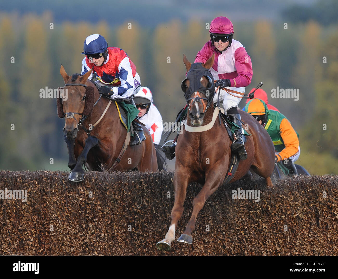 Ammunition ridden by Paddy Brennan (left) winners of the PP Business Improvement Handicap Steeple Chase Stock Photo