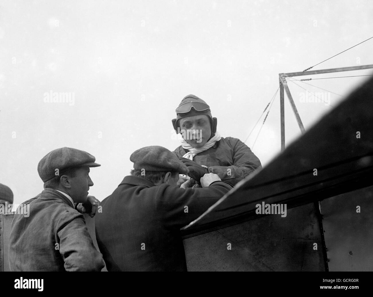 Pilot Gustav Hamel in his Bleriot monoplane before the first airmail flight from Hendon to Windsor. King George V had given permission for the aeroplane to land in the grounds of Windsor Castle. Stock Photo