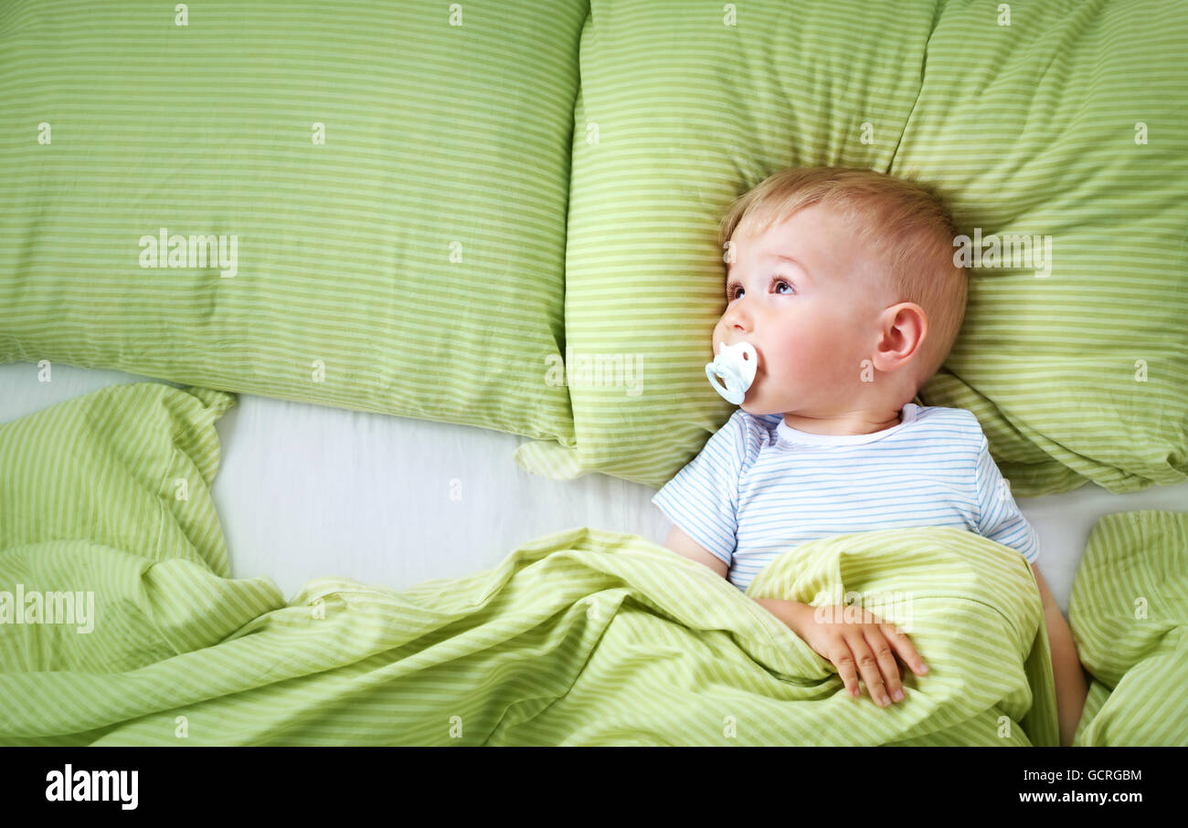 One year old baby in the bed Stock Photo Alamy