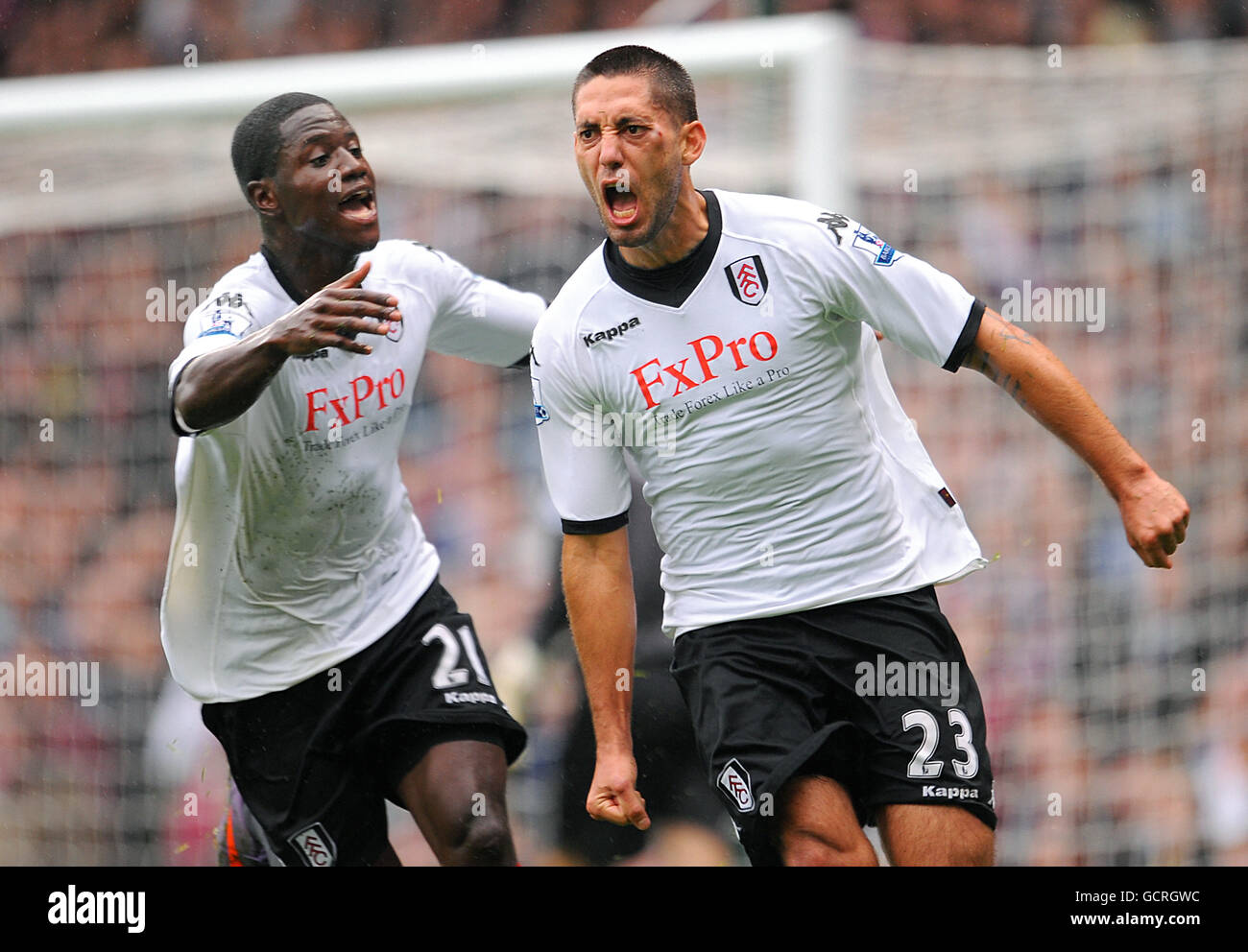 Fulham's Clint Dempsey (right) celebrates after scoring the opening goal of  the game with his team-mate Eddie Johnson (left Stock Photo - Alamy