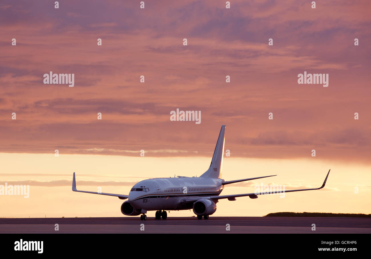 A plane on the tarmac at sunset, Keflavik International Airport, Iceland Stock Photo