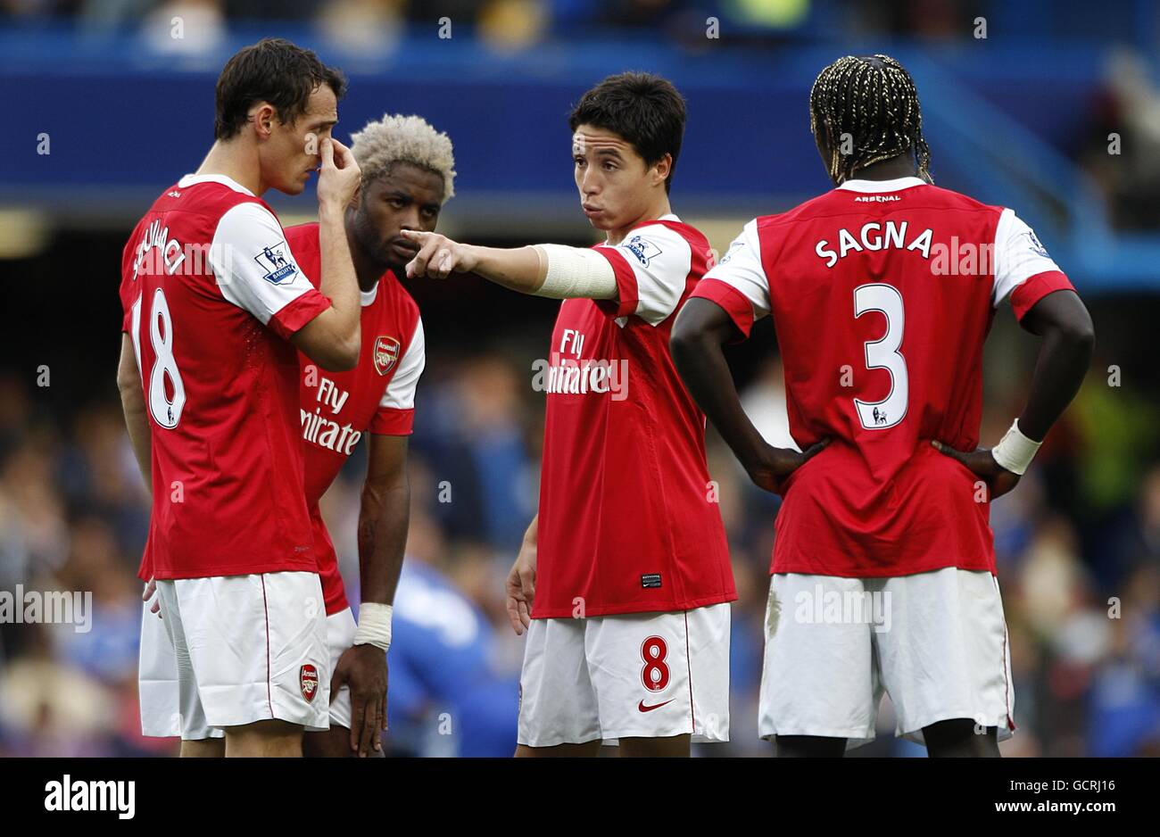 (left to right) Arsenal's Sebastien Squillaci, Alex Song, Samir Nasri and Bacary Sagna discuss tactics Stock Photo