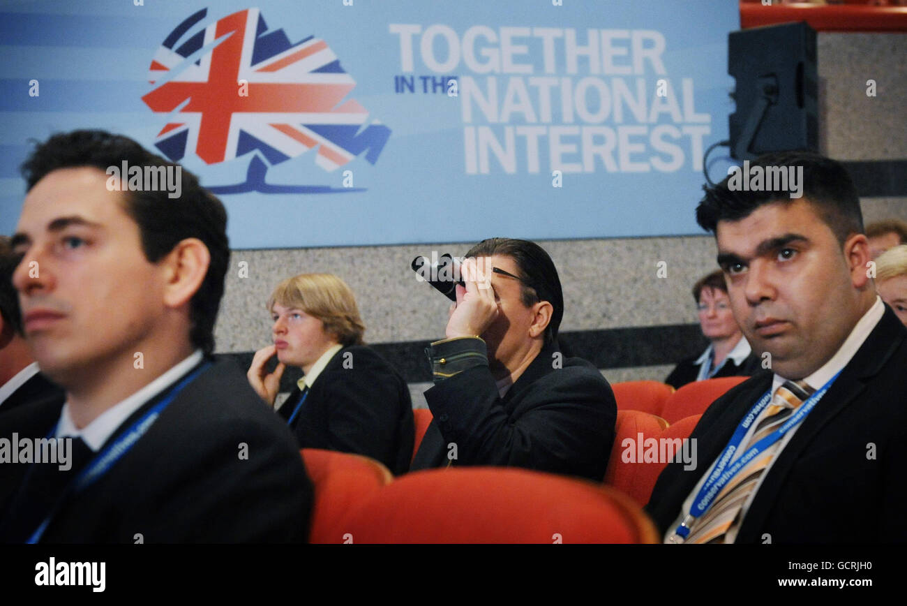 Delegates listen to Education Secretary Michael Gove's speech during the Conservative Party Annual Conference at the International Convention Centre, Birmingham. Stock Photo
