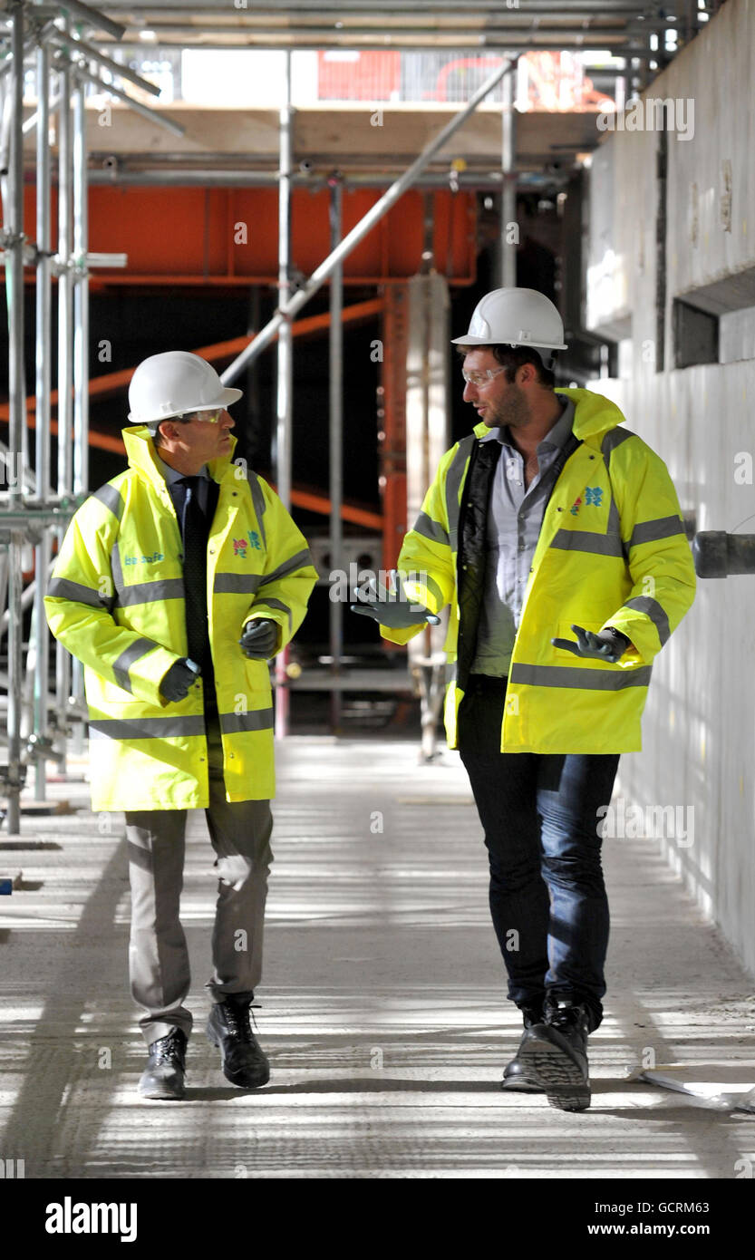 Five-time Olympic Gold Medallist Ian Thorpe visits the pool construction site at the London 2012 Aquatic Centre in east London, with Chair of the London 2012 Olympic Organising Committee Lord Coe. Stock Photo