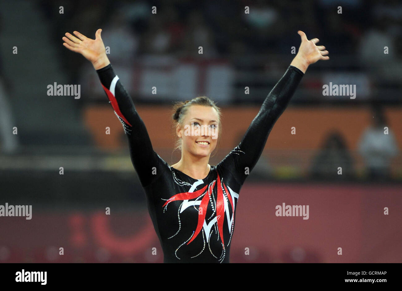 England's Imogen Cairns celebrates winning gold in the vault during Day Four of the 2010