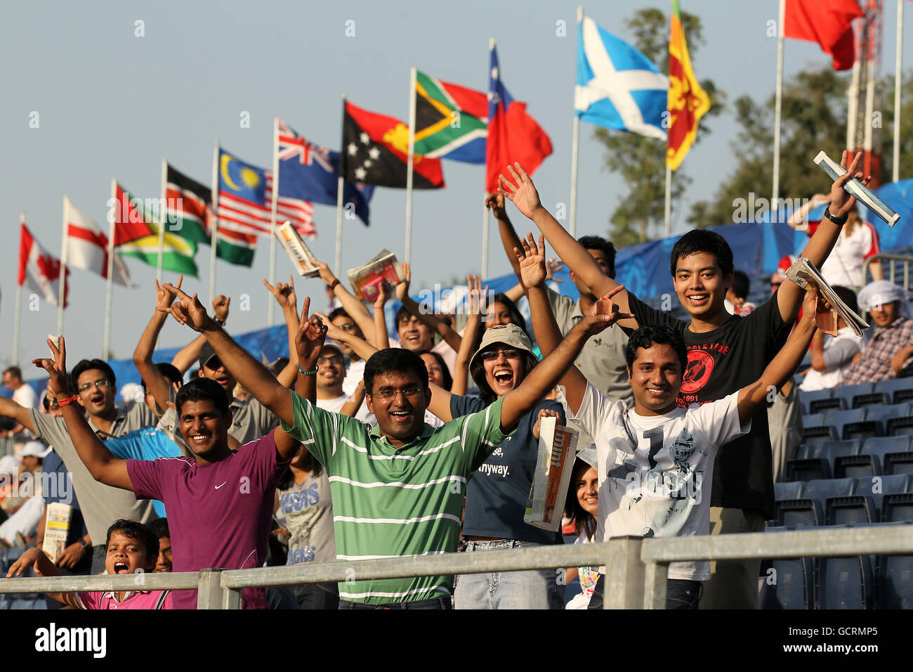 Spectators watch the action in the Rugby 7s round of pool matches at the Delhi University Stadium in Delhi, India Stock Photo
