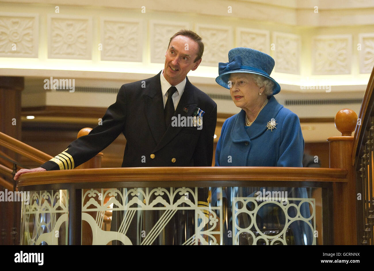 Queen Elizabeth II with Ship's Captain Chris Wells, during a tour of the  newest Cunard liner Queen Elizabeth, prior to Her Majesty naming the cruise  ship, the Queen Elizabeth in Southampton Stock