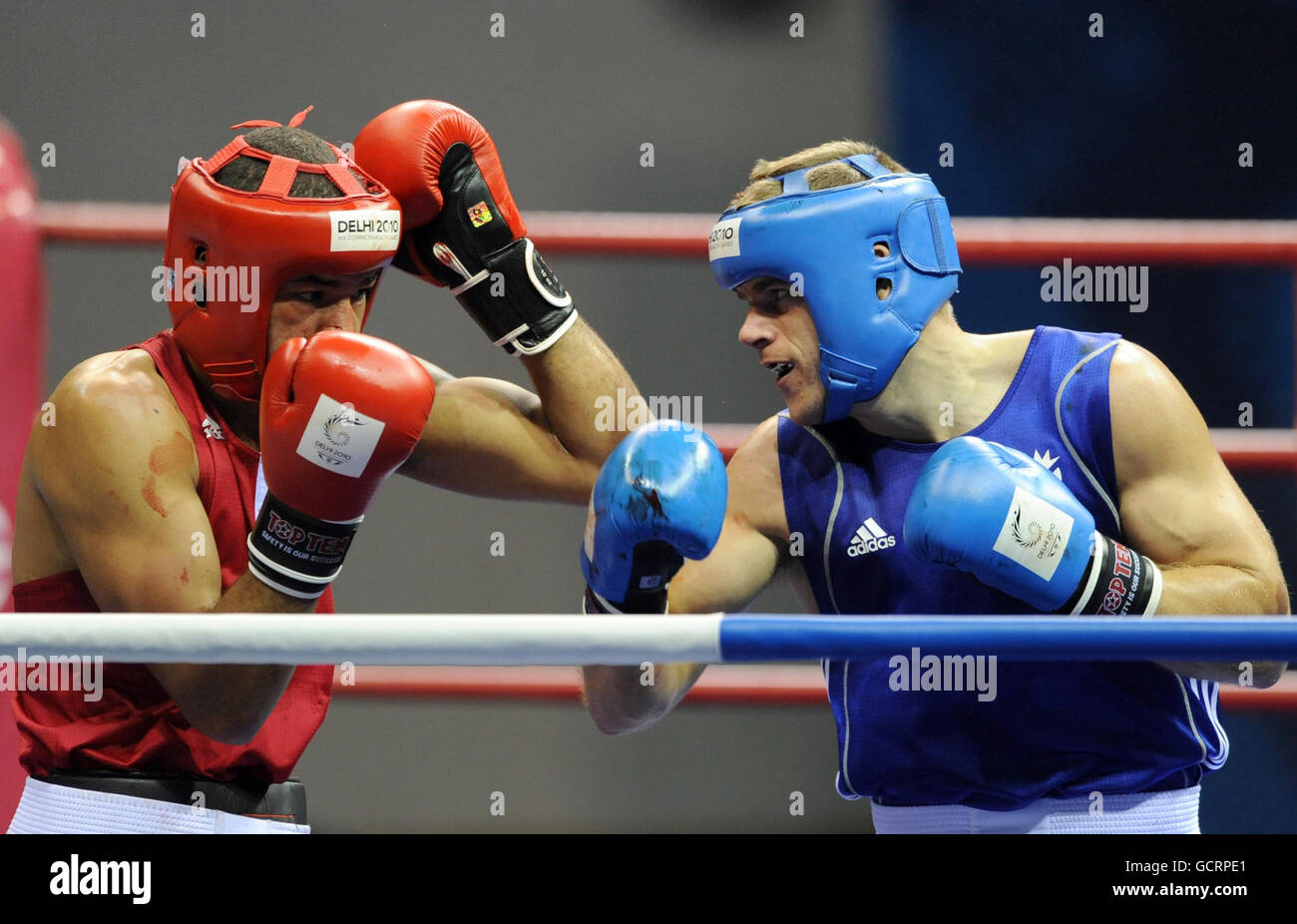 Scotland's Callum Johnson (blue) competes against Northern Ireland's ...