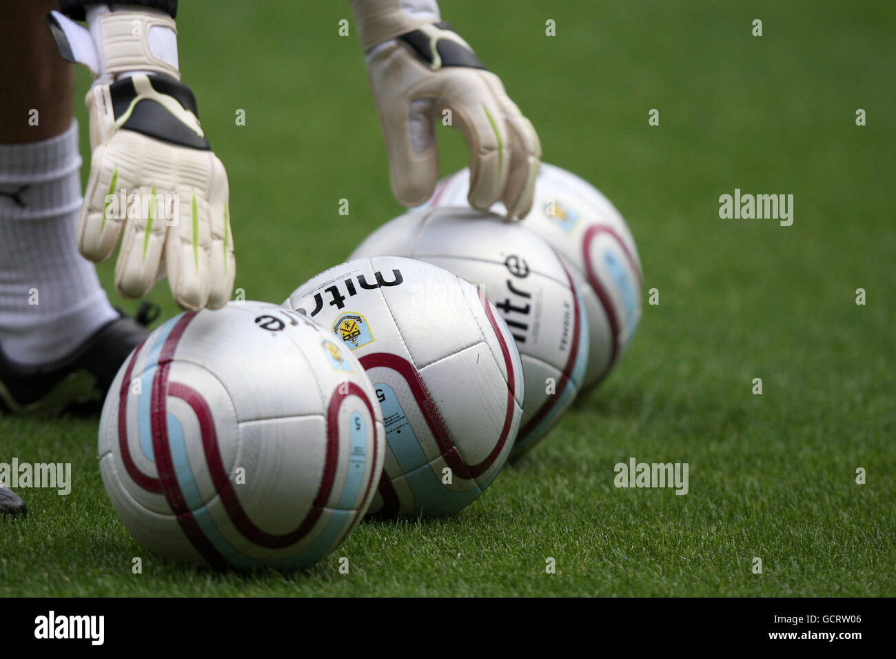 Soccer - npower Football League Championship - Sheffield United v Burnley - Bramall Lane. A goalkeeper reaches to pick up a Burnley match ball Stock Photo