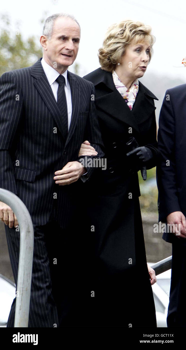 President Mary McAleese with her husband Martin at the funeral mass of