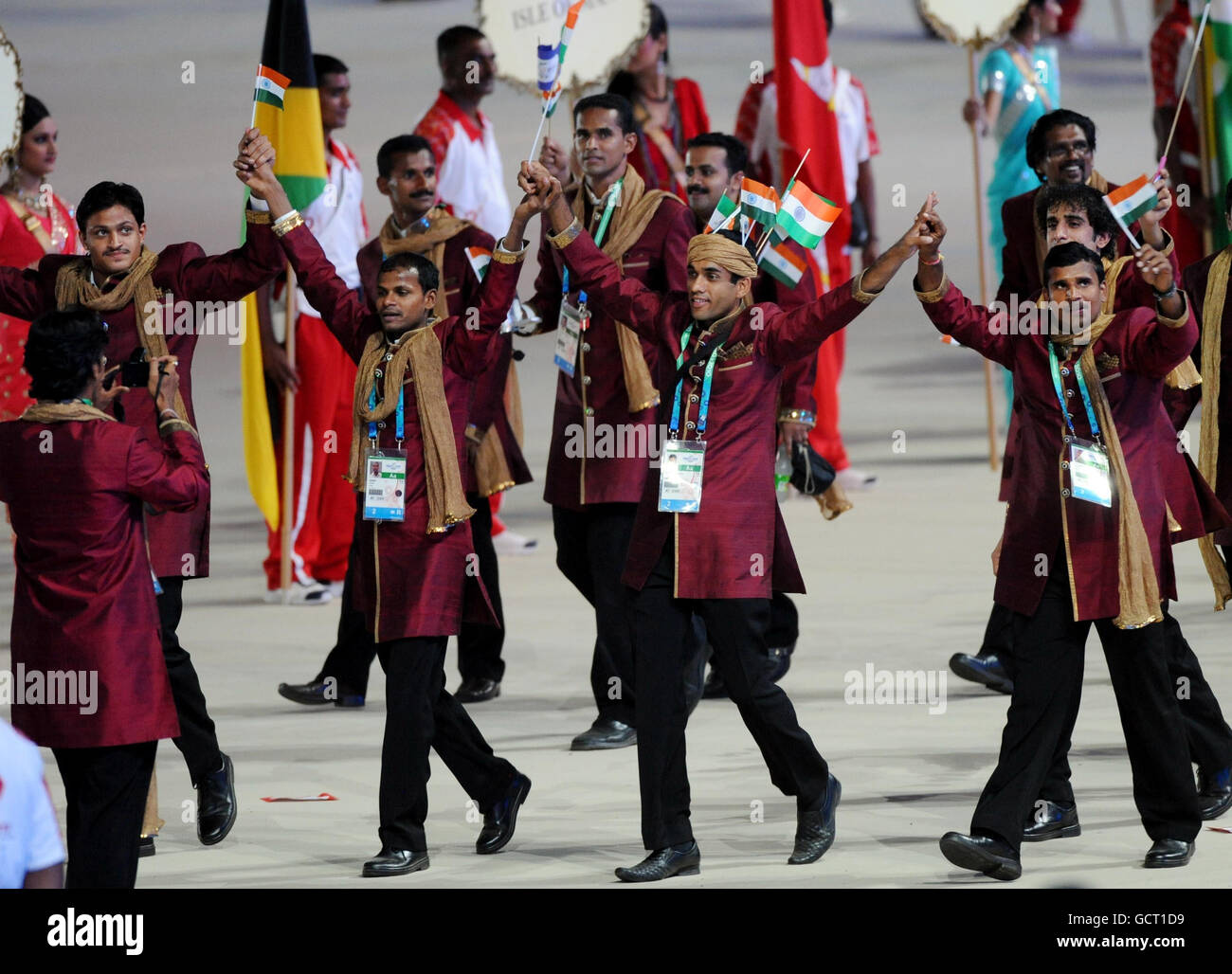 Members of Indian team during the 2010 Commonwealth Games opening ceremony at the Jawaharlal Nehru Stadium in New Delhi, India. Stock Photo