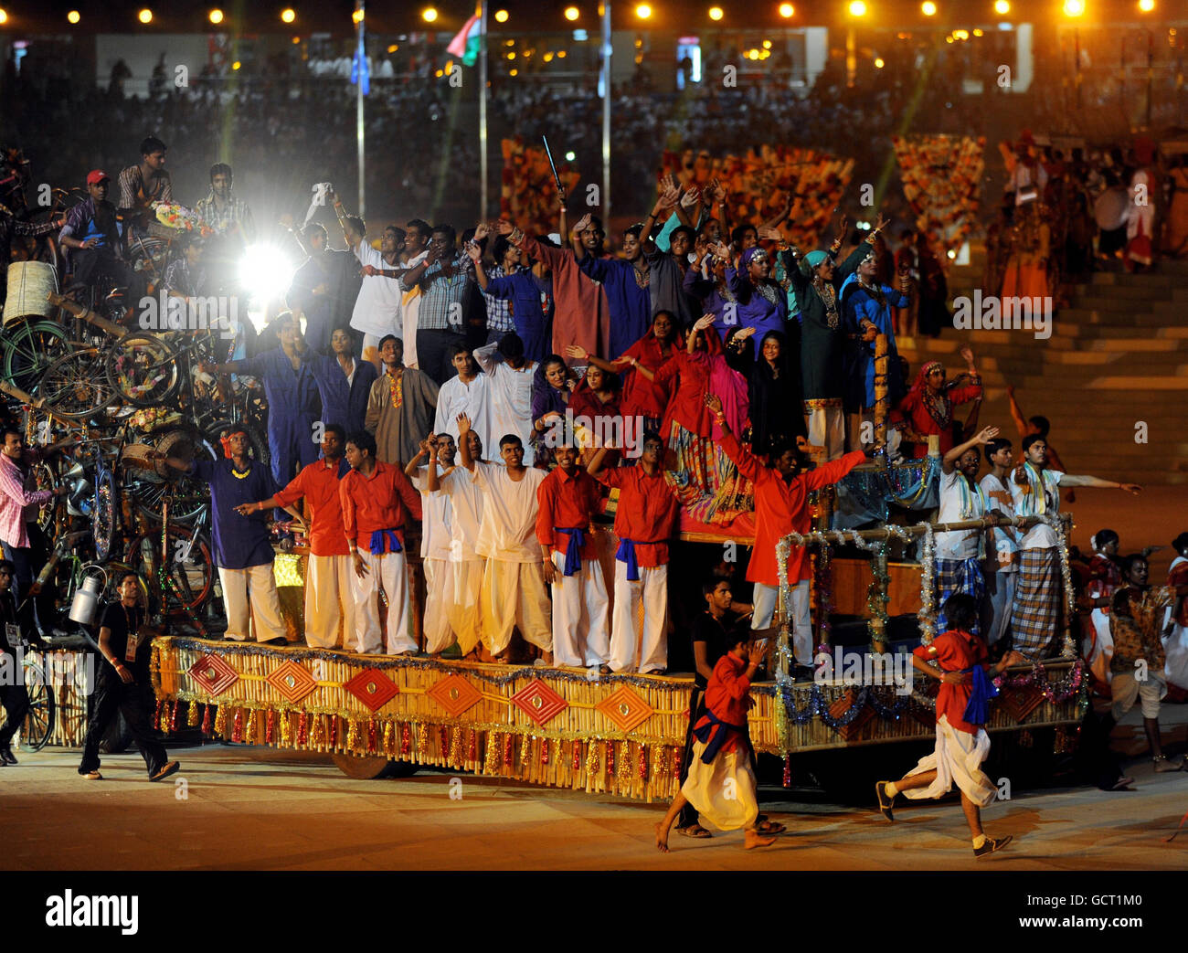 Performers on a float during the 2010 Commonwealth Games opening ceremony at the Jawaharlal Nehru Stadium in New Delhi, India. Stock Photo