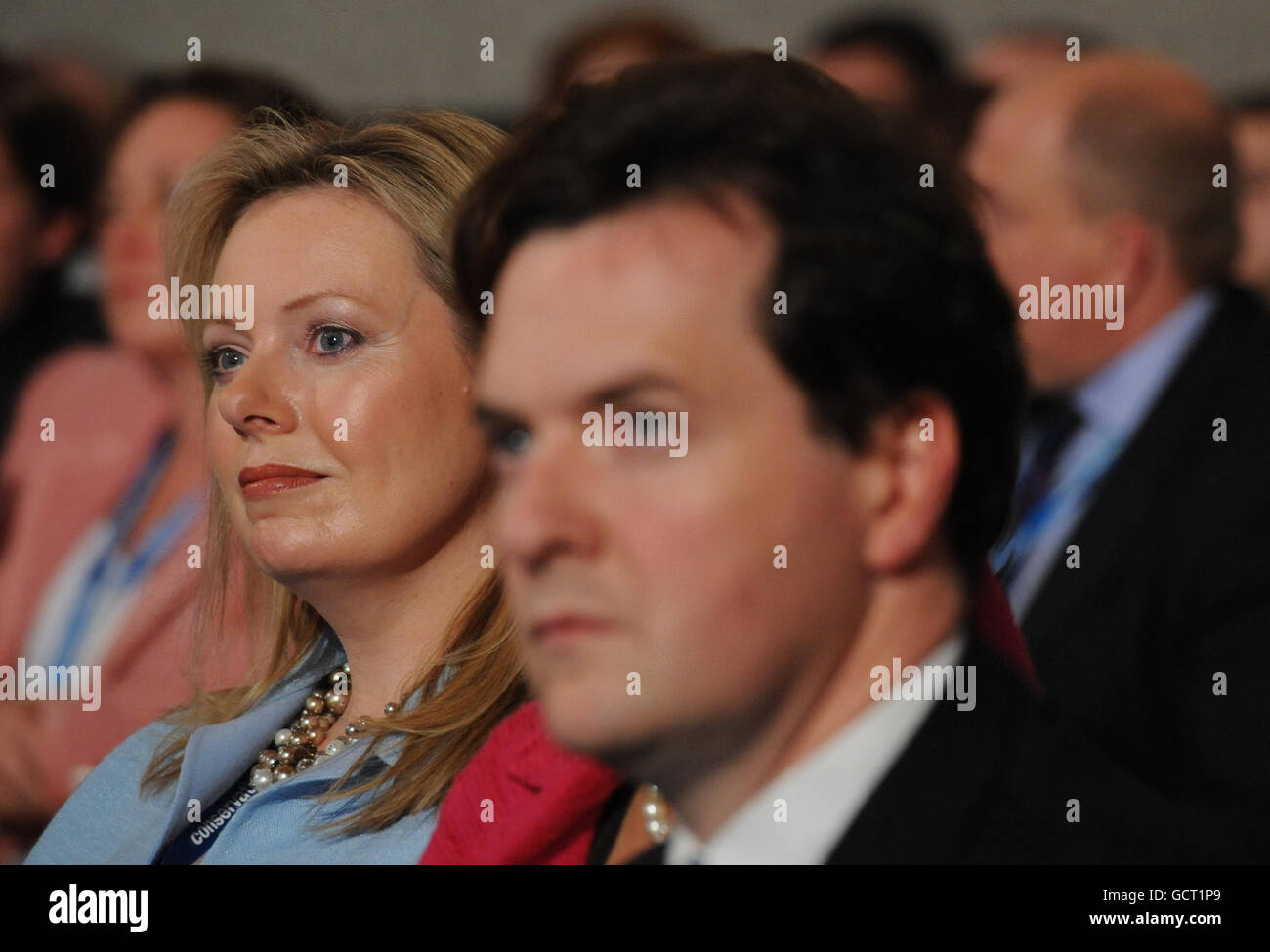 Ffion Hague wife of Foreign Secretary William Hague and Chancellor George Osborne listen to Mr Hague's speech to the opening session of the Annual Conservative Party Conference at the International Convention Centre, Birmingham. Stock Photo
