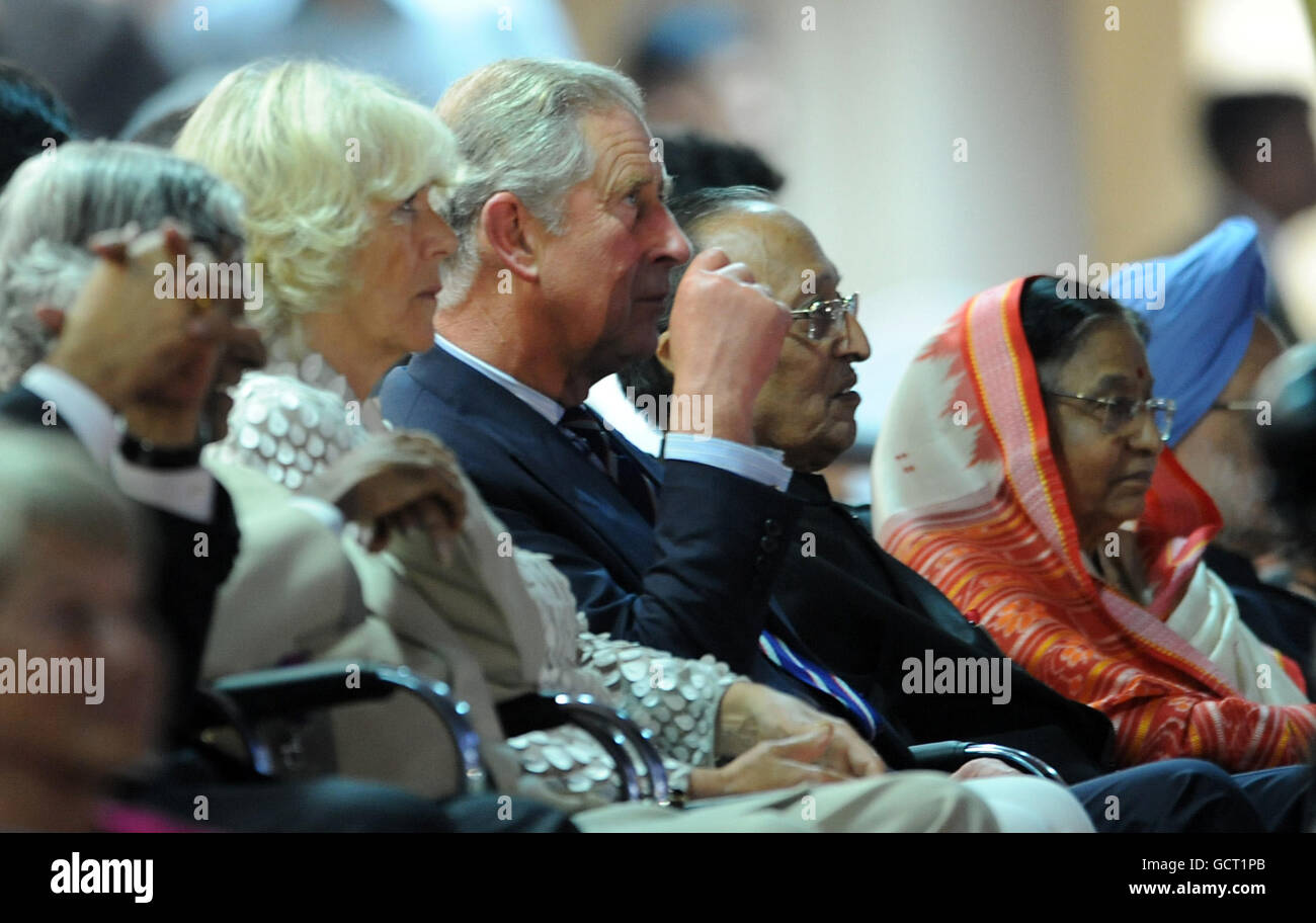 The Prince of Wales and the Duchess of Cornwall attend the opening ceremony of the 2010 Commonwealth Games in New Delhi, India. Stock Photo
