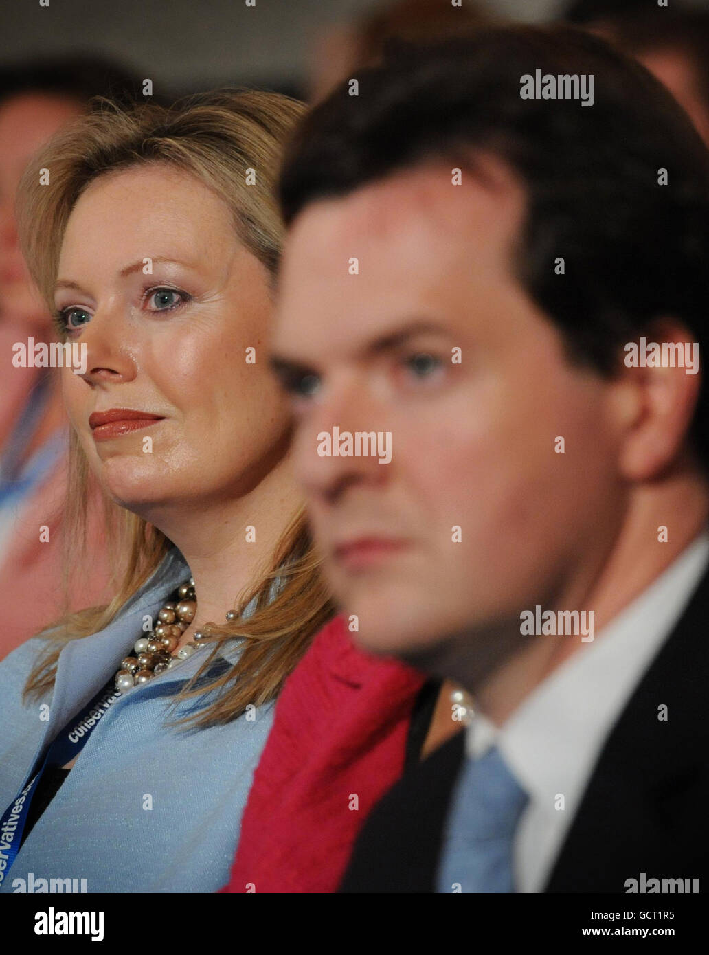Ffion Hague wife of Foreign Secretary William Hague and Chancellor George Osborne listen to Mr Hague's speech to the opening session of the Annual Conservative Party Conference at the International Convention Centre, Birmingham. Stock Photo
