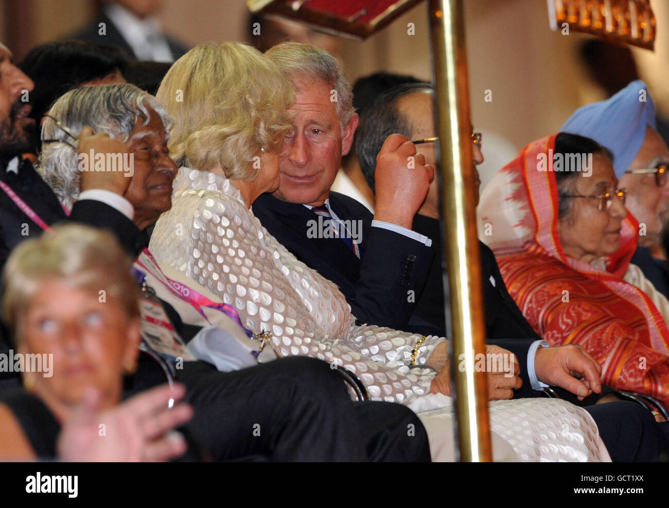 The Prince of Wales and the Duchess of Cornwall attend the opening ceremony of the 2010 Commonwealth Games in New Delhi, India. Stock Photo