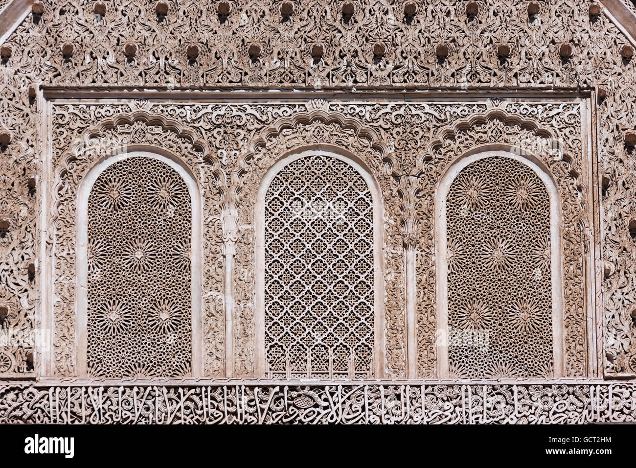 Wood carving detail inside the Medersa Bou Inania (coranic school) in the medina of Fès. Stock Photo