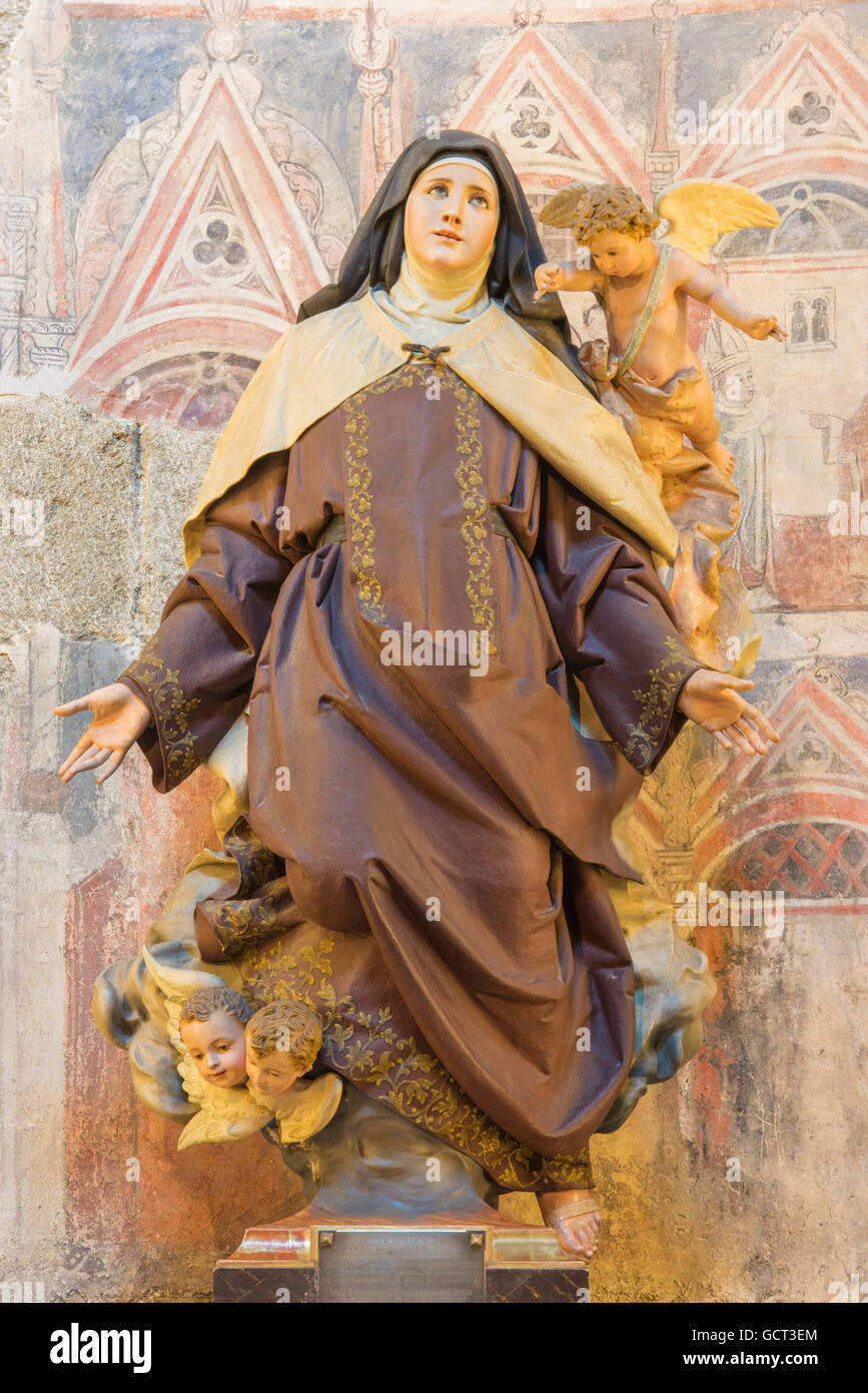 AVILA, SPAIN, APRIL - 18, 2016: The polychrome carved statue of St. Theresia of Avila in Catedral de Cristo Salvador Stock Photo
