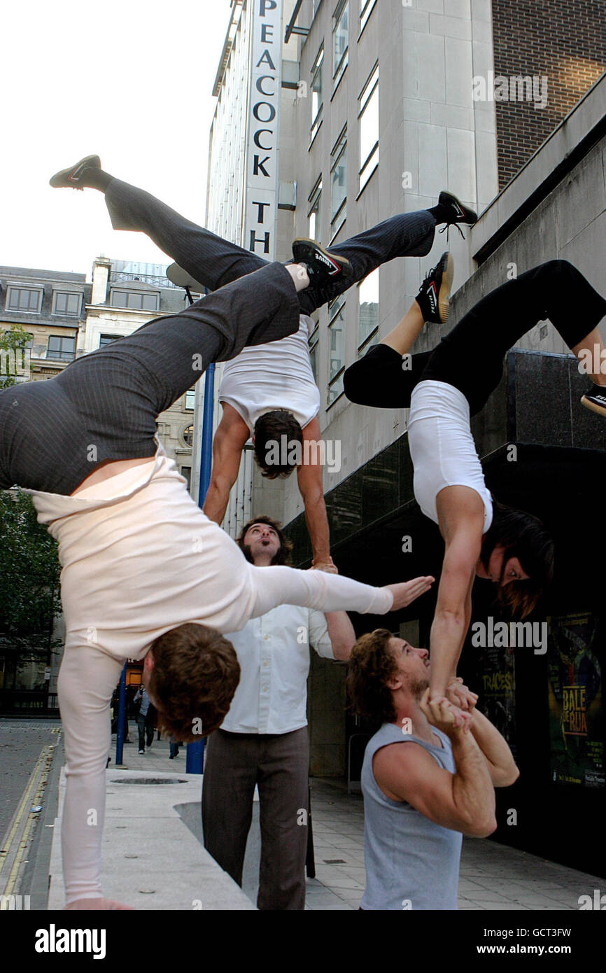 Members of The 7 Fingers circus troupe perform an act from their new show, Traces, which runs until 30th October 2010, during a photocall at the Peacock Theatre, London. Stock Photo