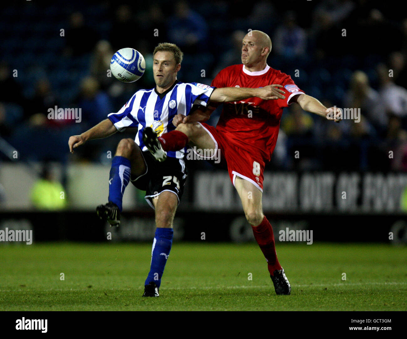 Sheffield Wednesday's Chris Sedgwick battles for possesion of the ball with Chesterfield's Derek Niven Stock Photo