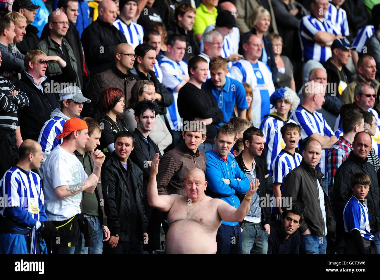 Soccer - npower Football League One - Notts County v Sheffield Wednesday - Meadow Lane. Sheffield Wednesday fan Paul Gregory, also known as Tango Man, (centre) shows his support in the stands Stock Photo