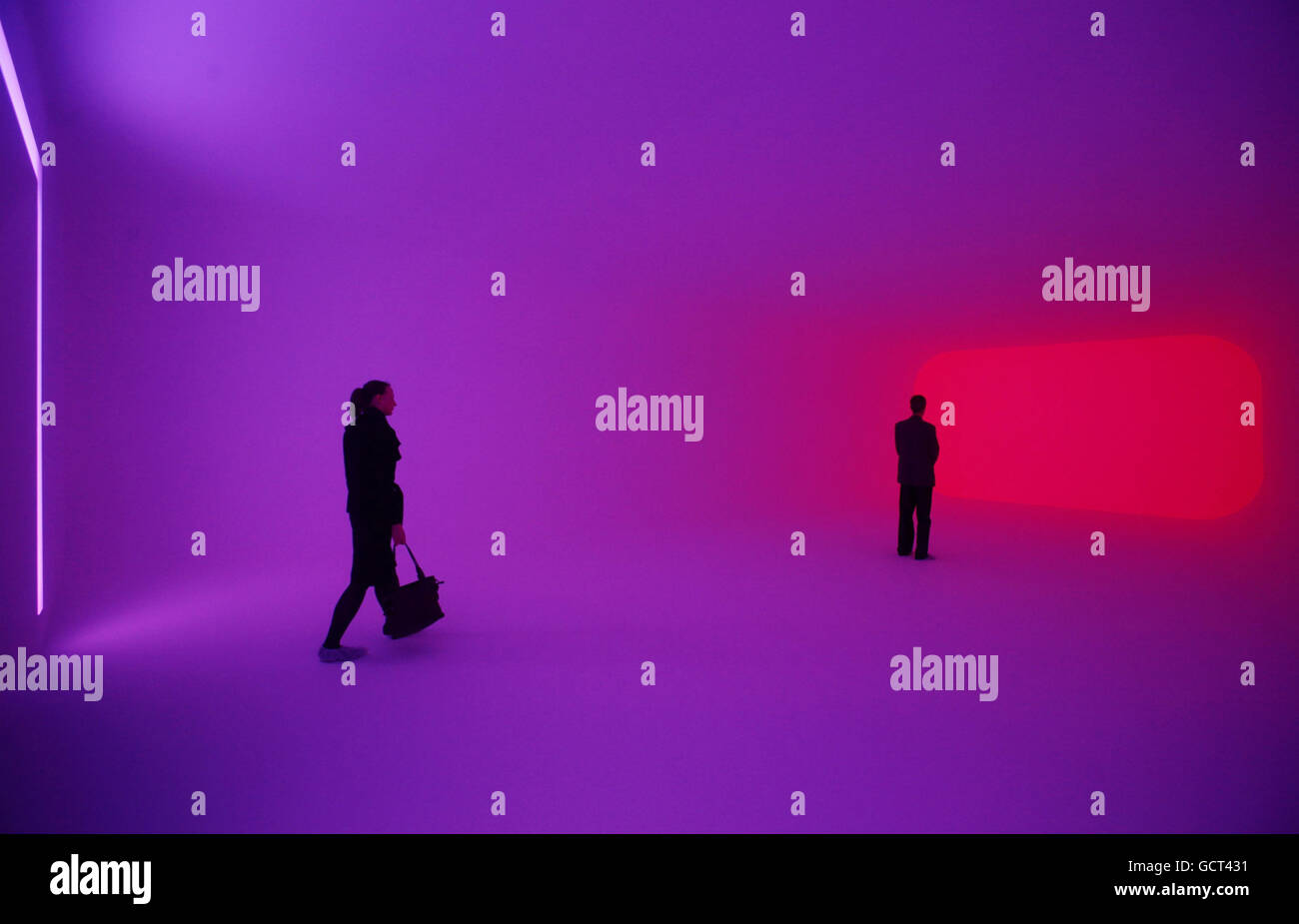 Visitors exploring 'Dhatu 2010' an interior space with coloured