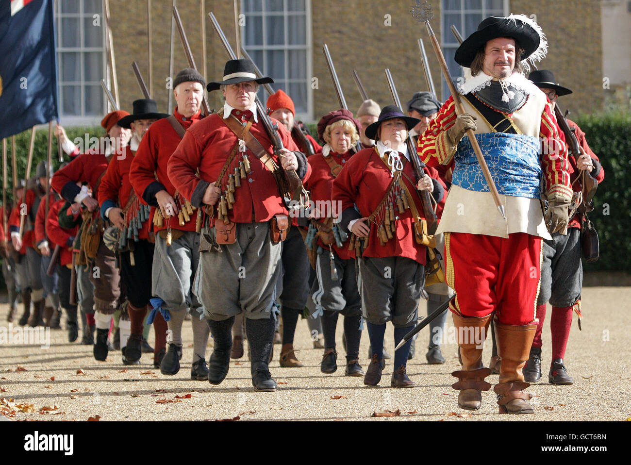 Members of the Roundhead Association march to mark the 350th anniversary of the execution of The Regicides, the name given to those who signed the death warrant of Charles I, at Horse Guards Parade, London. Stock Photo