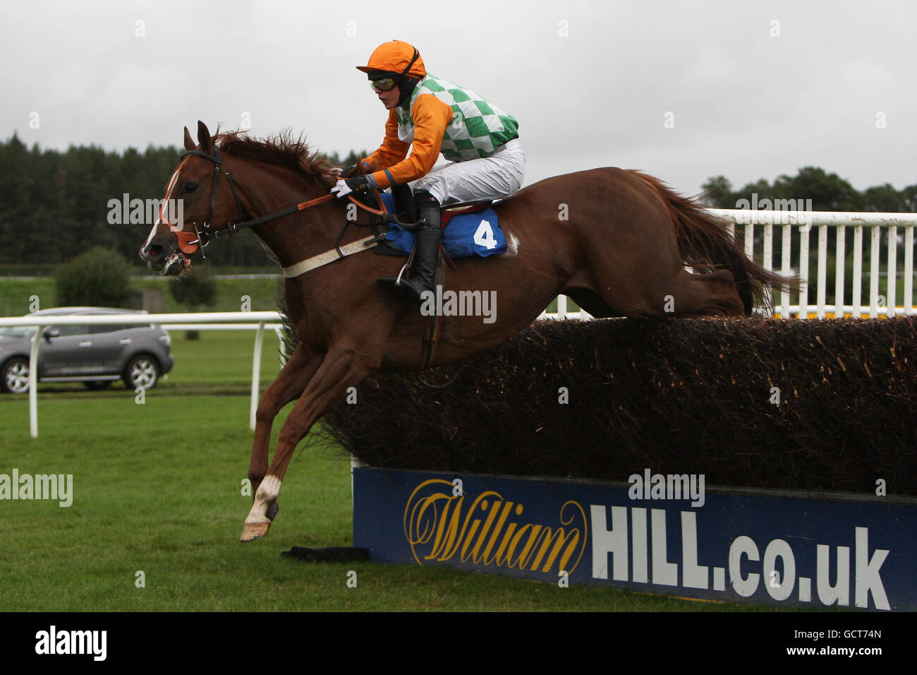 Horse Racing - FSB Family Funday - Market Rasen. Feeling Peckish ridden by Tjade Collier jumps the fence during the 40% Better Off On Betfair SP Novices' Chase Stock Photo