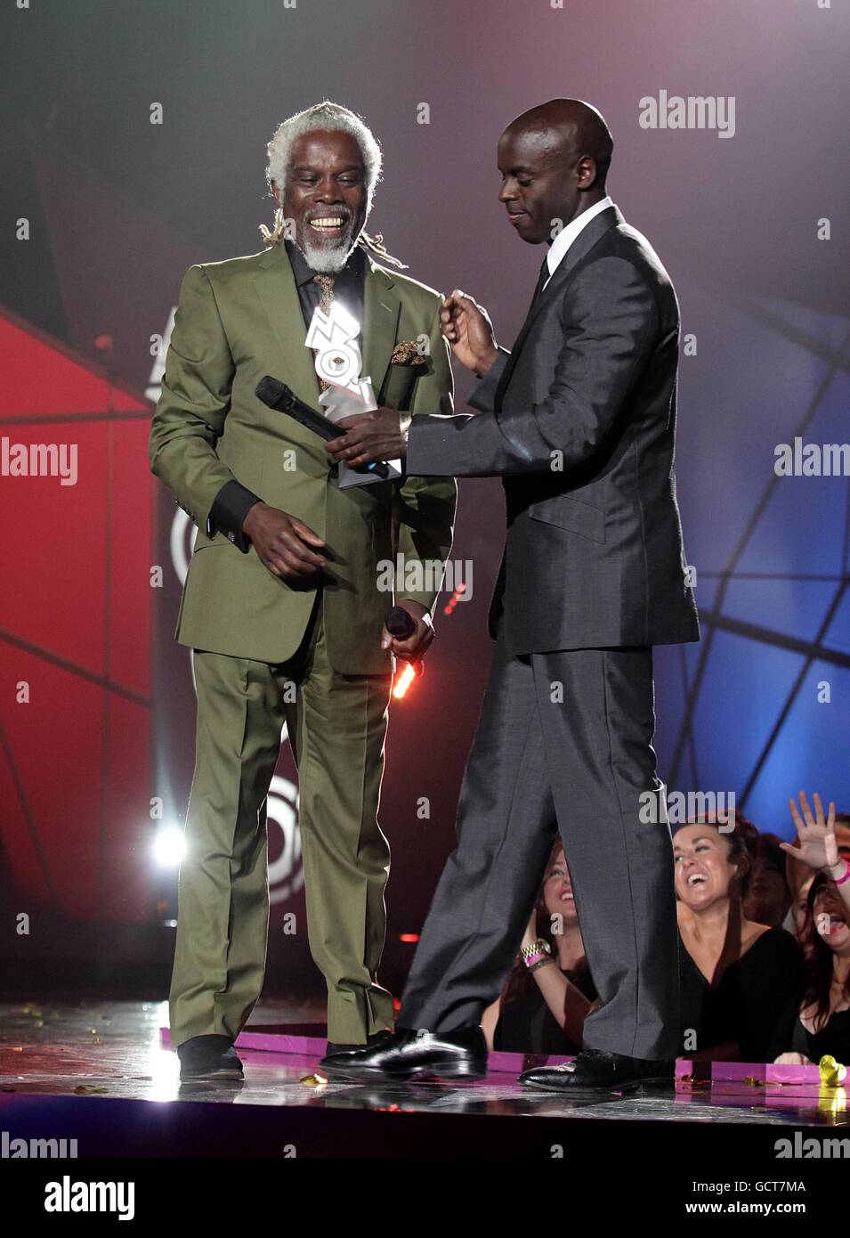 Billy Ocean receives his Lifetime Achievement award from Trevor Nelson (right) during the 2010 Mobo Awards, at the Echo Arena, Monarchs Quay, Albert Dock, Liverpool. Stock Photo
